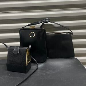 Bundle of three vintage black and gold bags